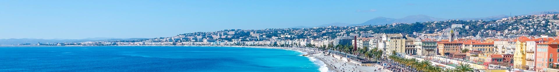 Panoramic view of Nice coastline with turquoise waters and vibrant cityscape | MSC Cruises Panoramic view of Nice coastline with turquoise waters and vibrant cityscape | MSC Cruises