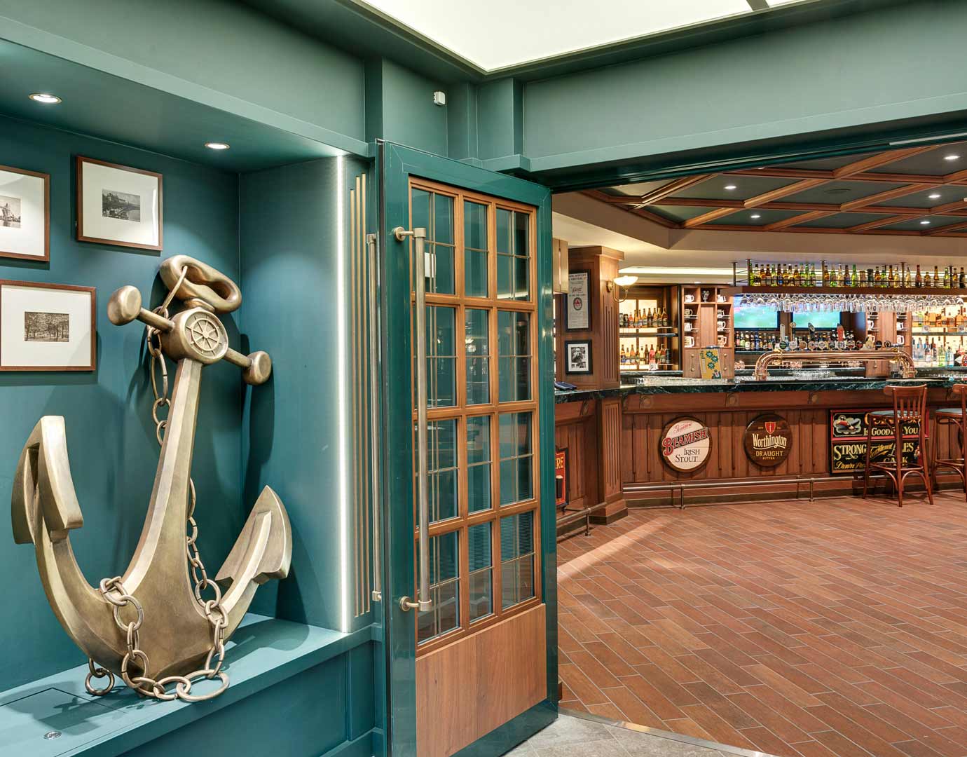 Elegant onboard bar with nautical decor and anchor sculpture | MSC Cruises
