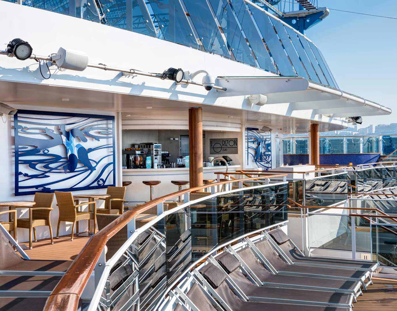 Outdoor Horizon Bar with modern decor and sun loungers on an MSC Cruises ship | MSC Cruises